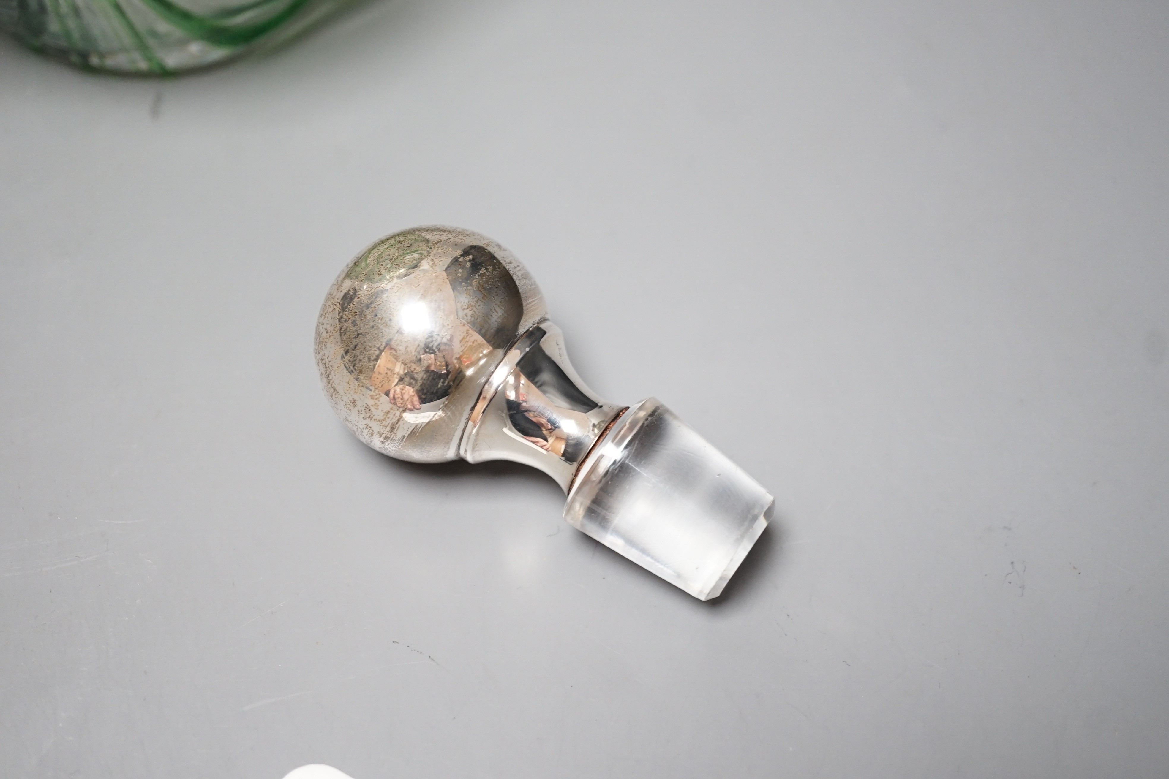 A late Victorian Art Nouveau silver mounted glass claret jug and stopper, D & M Davis, Birmingham, 1900, the glass with ribbed green swags, height 20.7cm.